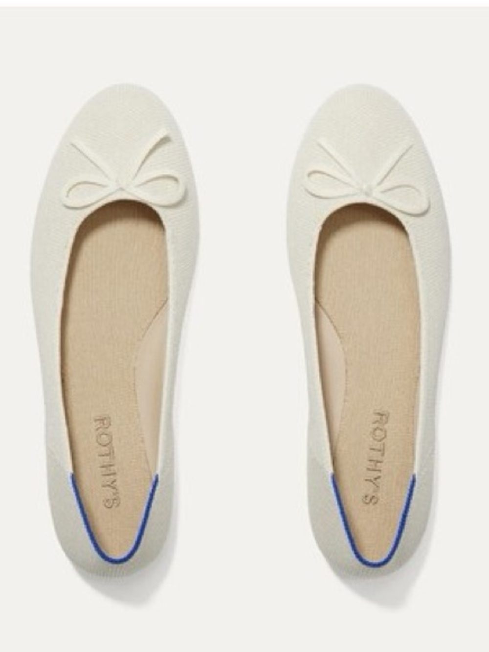 Rothy's Ivory Ballet Flats with Blue Heel Trim